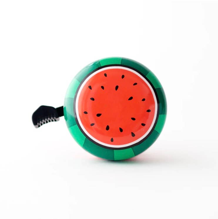 Red Beep Watermelon bike and scooter bell with watermelon design and bell mechanism, mounted on a bike handlebar.