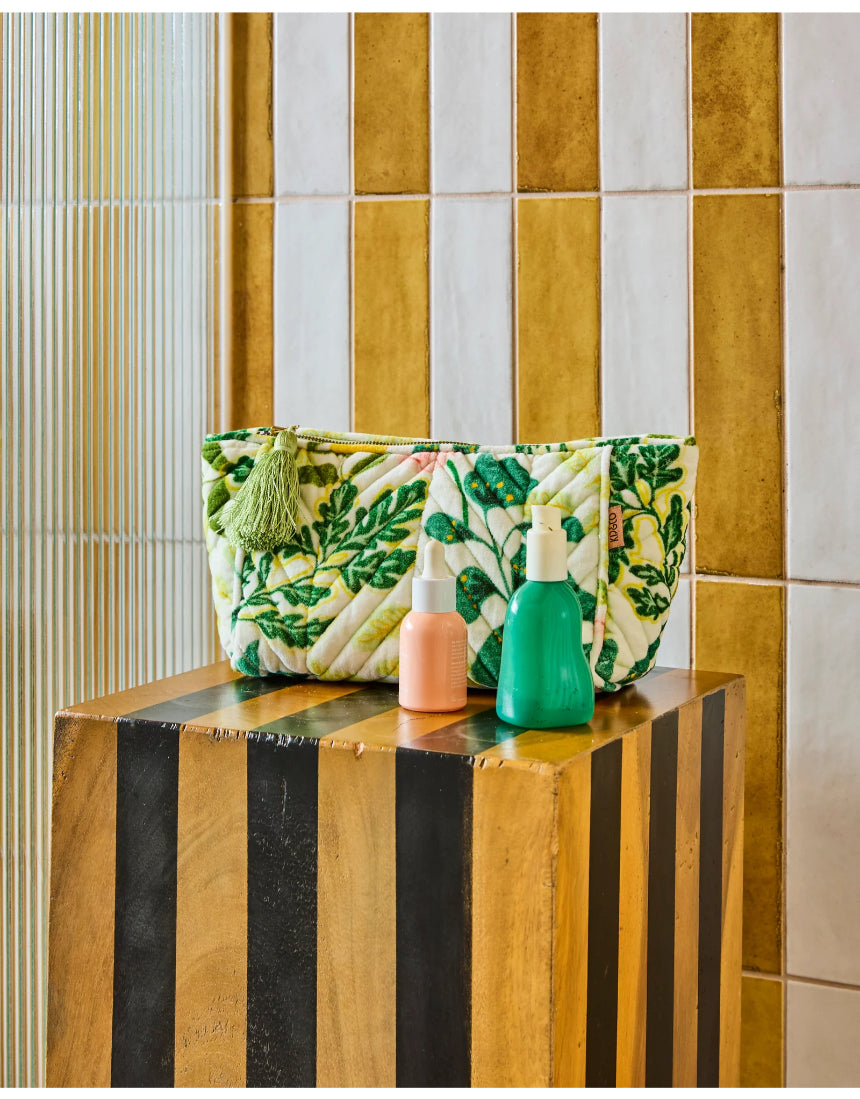 Kip & Co Wander Velvet Toiletry Bag in vibrant patterned velvet fabric, compact travel accessories for organization.