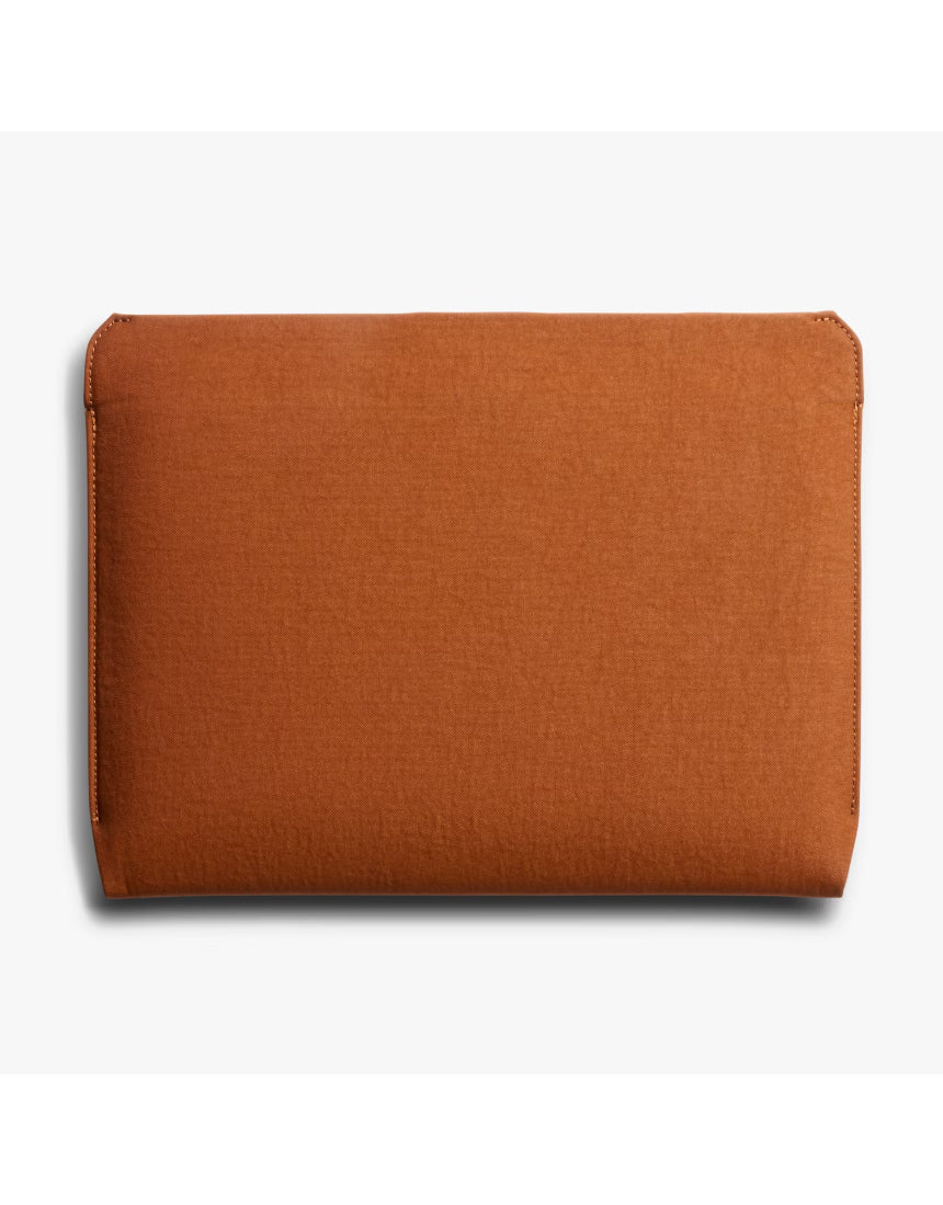 Bellroy 16-inch bronze laptop sleeve with sleek design and padded interior for protection and style.