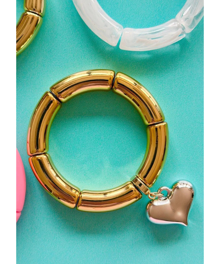 Mosk Melbourne Big Heart bracelet featuring a silver chain and a prominent heart-shaped pendant on a white background.