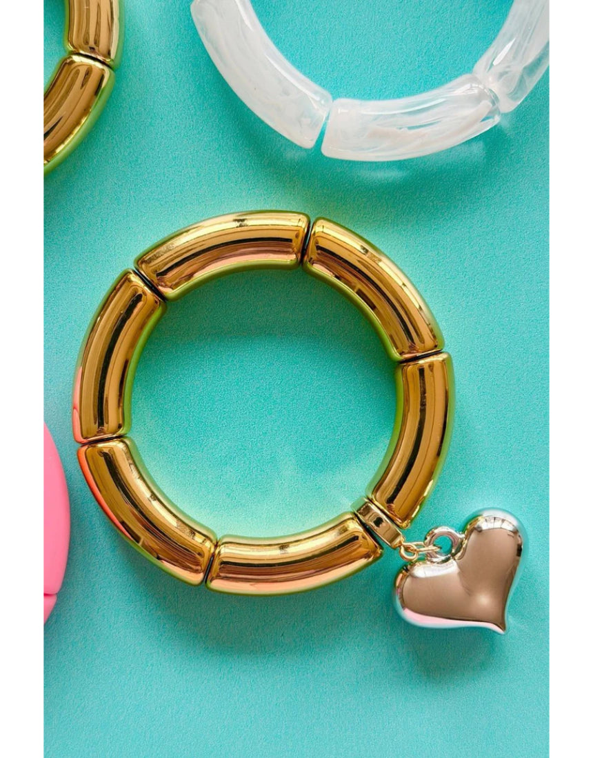 Mosk Melbourne Big Heart bracelet featuring a silver chain and a prominent heart-shaped pendant on a white background.