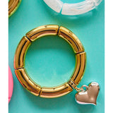 Mosk Melbourne Big Heart bracelet featuring a silver chain and a prominent heart-shaped pendant on a white background.