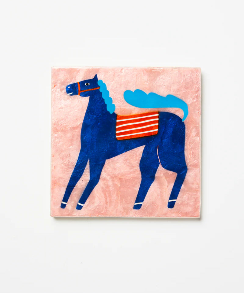 Jones & Co Superette Pony Tile wall decor featuring colorful, vintage-inspired ceramic tile design.