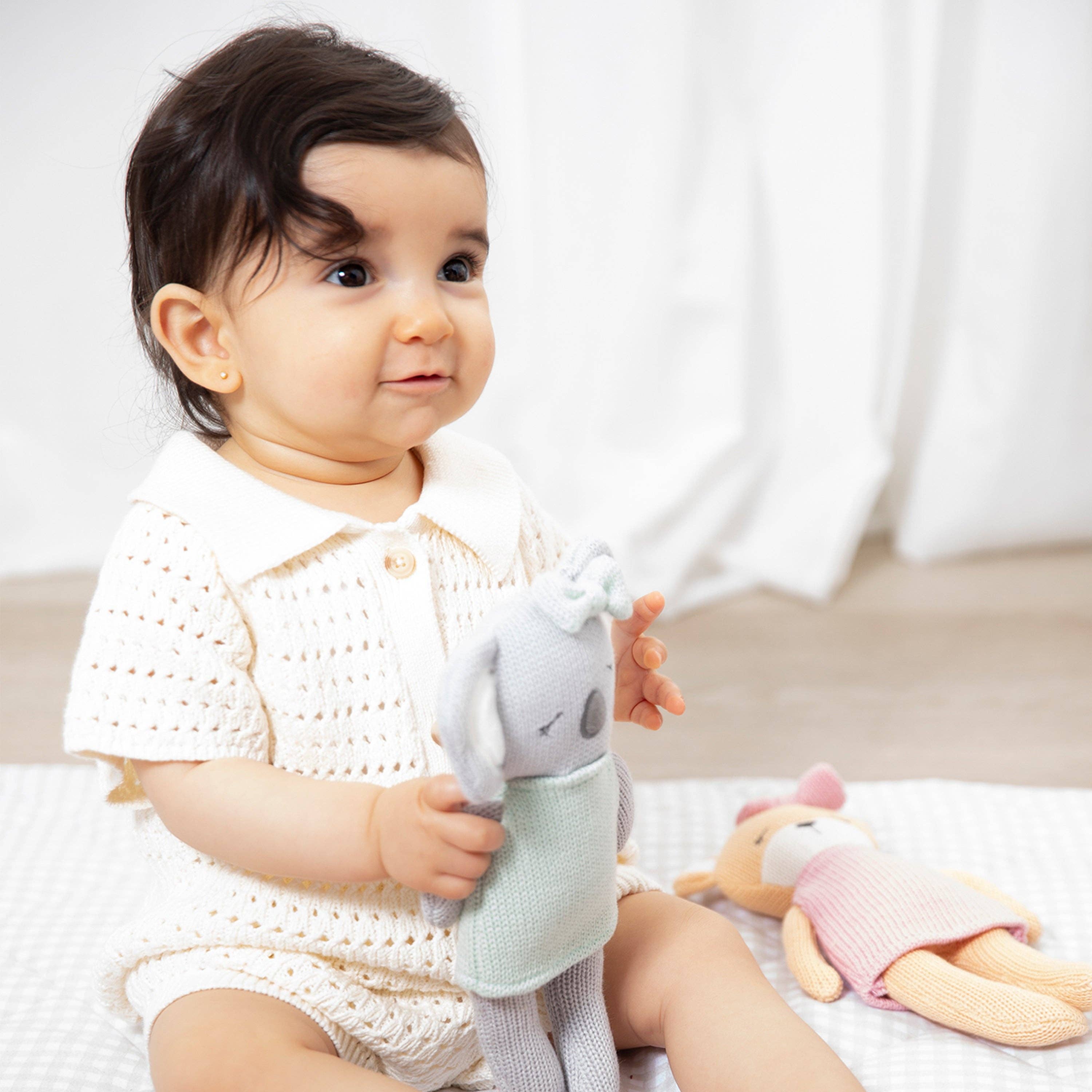 Living Textiles Kimmy the Koala knitted animal toy with soft, plush fabric and detailed features, perfect for cuddling and play.