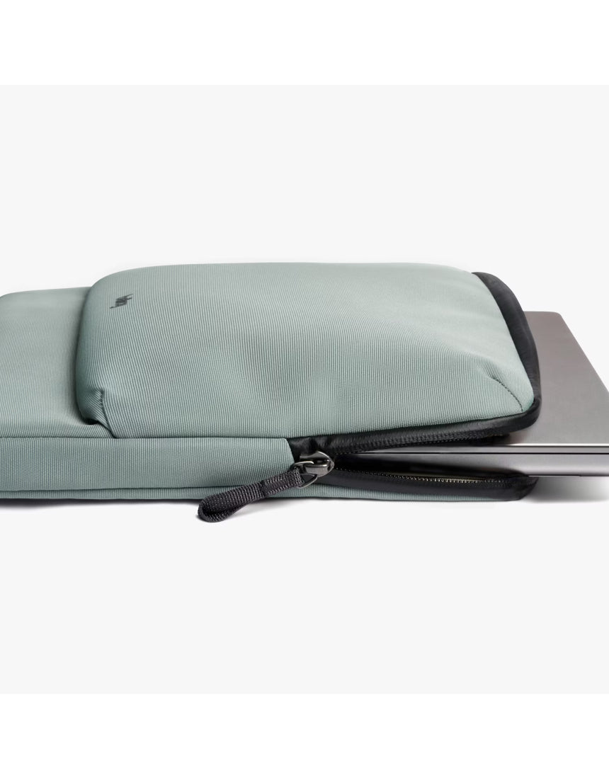 Bellroy 14-inch Laptop Caddy in Eucalyptus with organized compartments for accessories and laptop storage.