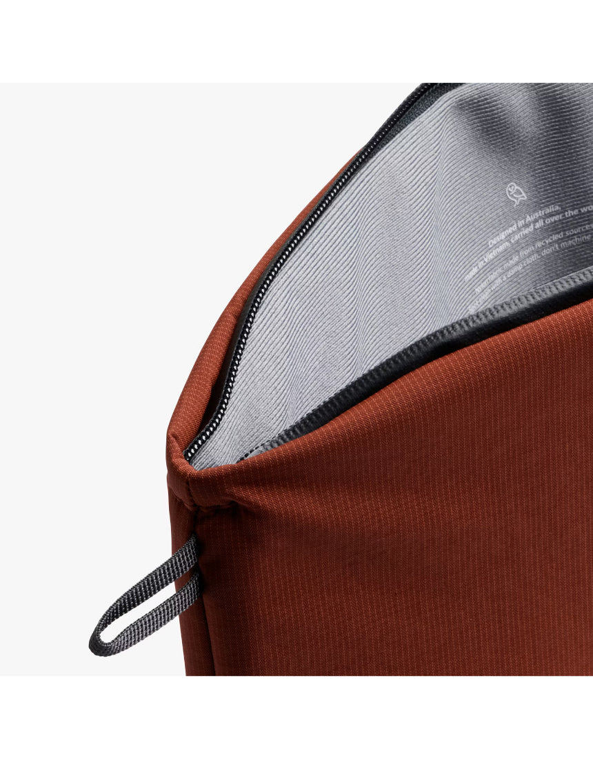 Bellroy Lite 14-inch Clay laptop sleeve showing a slim, protective design with soft interior lining and durable exterior fabric.