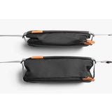 Bellroy sling bag in slate color, compact and stylish with adjustable strap, perfect for carrying essentials comfortably.
