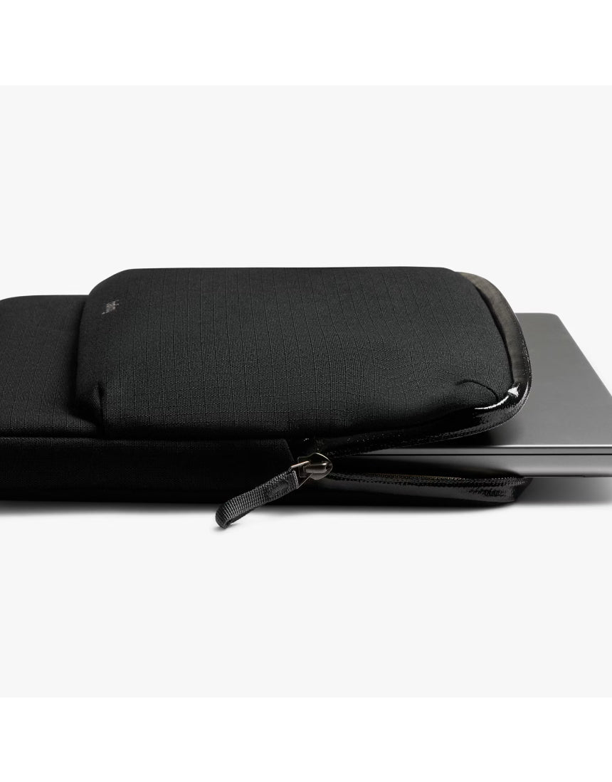 Black Bellroy Laptop Caddy for 14-inch laptops with organized compartments and sleek design.