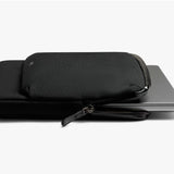 Black Bellroy Laptop Caddy for 14-inch laptops with organized compartments and sleek design.
