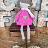 Amaranta Designs Bubblegum Doll with vibrant pink hair and colorful outfit, posing against a neutral background