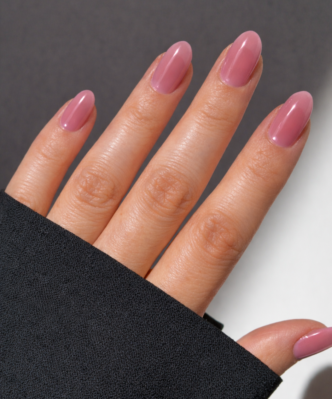 Hanami Cosmetics Fade Into You jelly nail polish bottle with pastel purple and pink shades, showcasing the vibrant, glossy finish.