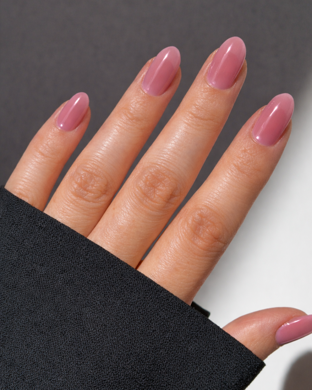 Hanami Cosmetics Fade Into You jelly nail polish bottle with pastel purple and pink shades, showcasing the vibrant, glossy finish.