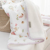 Living Textiles Jersey Sherpa Pram Blanket in Whimsical Wonderland with soft, cozy fabric and playful printed design for babies.