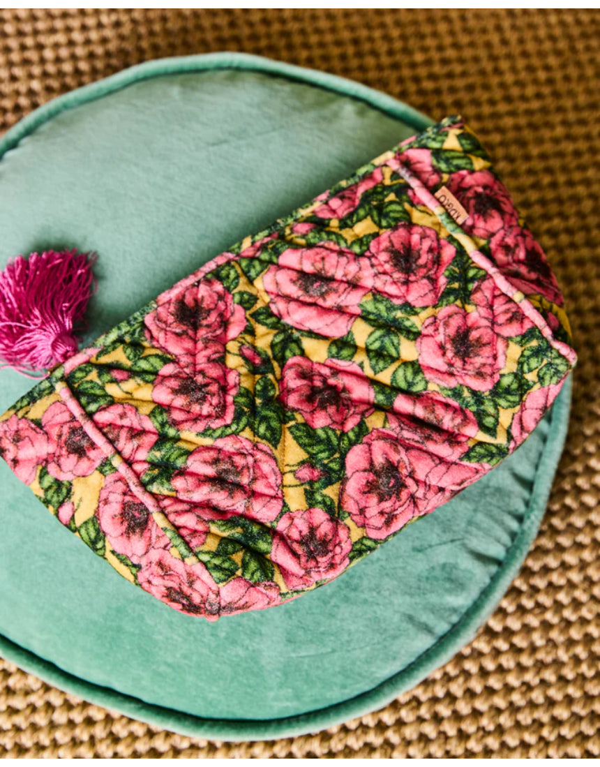 Kip & Co Golden Peony velvet toiletry bag with floral pattern, soft velvet fabric, and zipper closure for accessories storage.