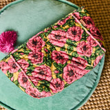 Kip & Co Golden Peony velvet toiletry bag with floral pattern, soft velvet fabric, and zipper closure for accessories storage.