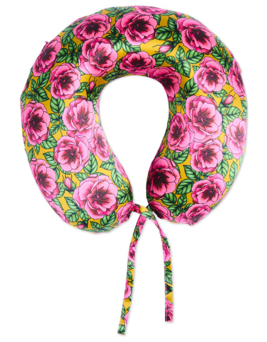 Kip & Co Golden Peony silk travel pillow with plush yellow fabric and decorative floral pattern for comfortable travel rest.