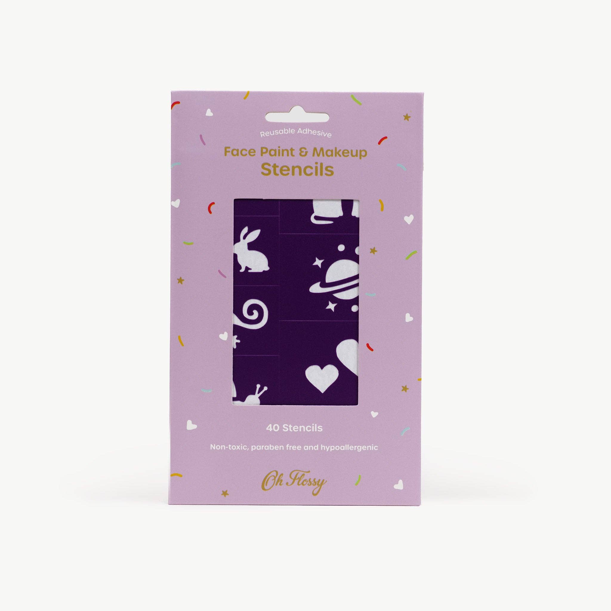 Purple reusable adhesive face paint stencil by Oh Flossy with intricate design for creative face art and makeup application.