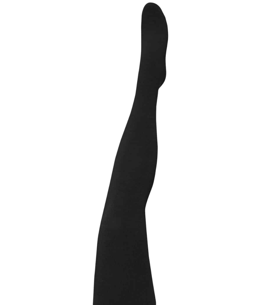 Black merino wool tights by Tightology, featuring a snug fit and smooth texture for warmth and comfort.