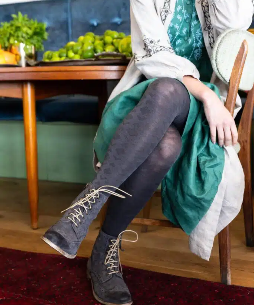 Tightology Deco Grey Merino Wool Tights displayed on a mannequin, showcasing their snug fit and soft wool texture.