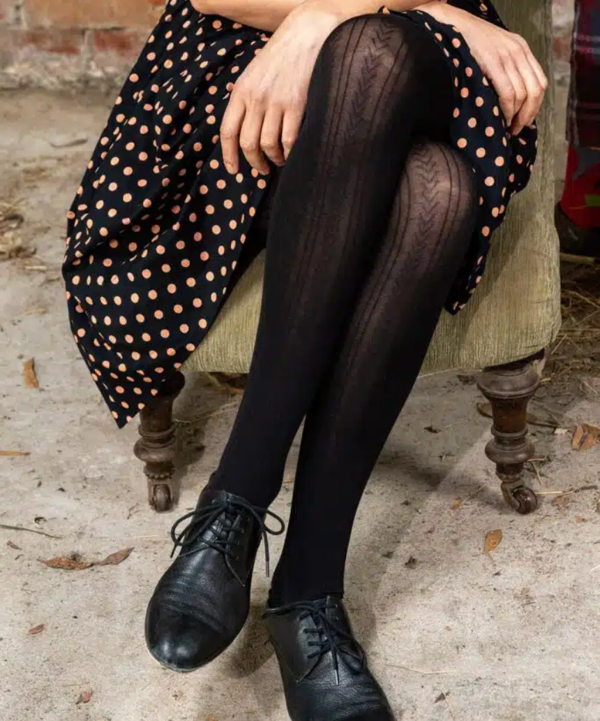 Black cotton tights by Tightology featuring a snug fit and smooth texture, ideal for stylish, comfortable wear.