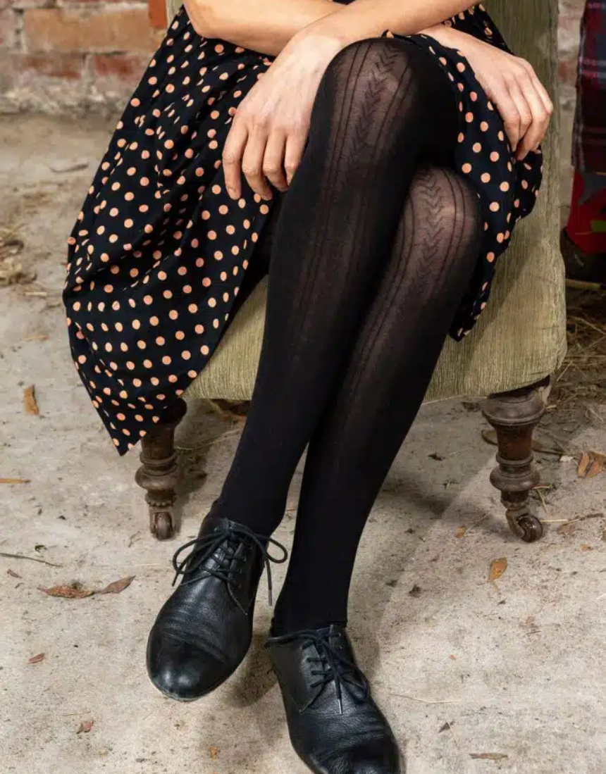 Black cotton tights by Tightology featuring a snug fit and smooth texture, ideal for stylish, comfortable wear.