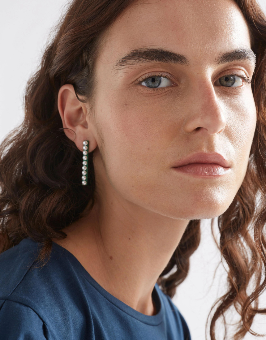 Elk Margit stud earring featuring a small, elegant silver design with a textured finish and post-back closure.