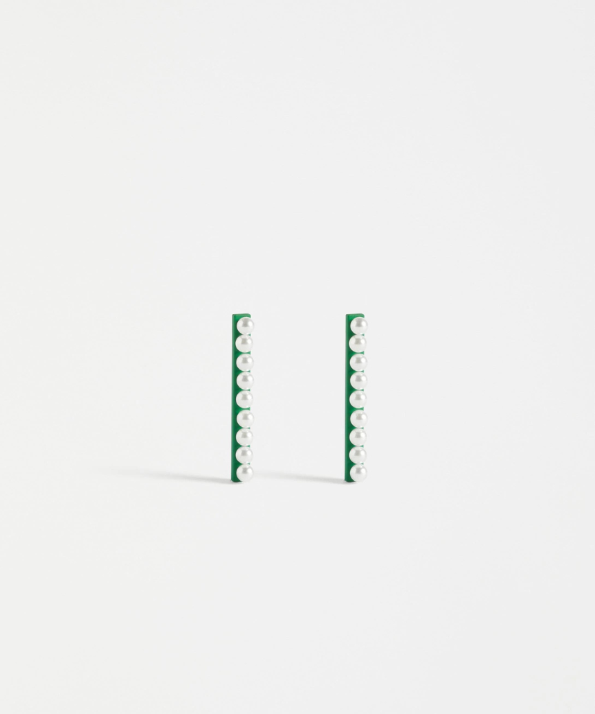 Elk Margit Stud Earring featuring a minimalist design with a small, round silver stud on a plain background.