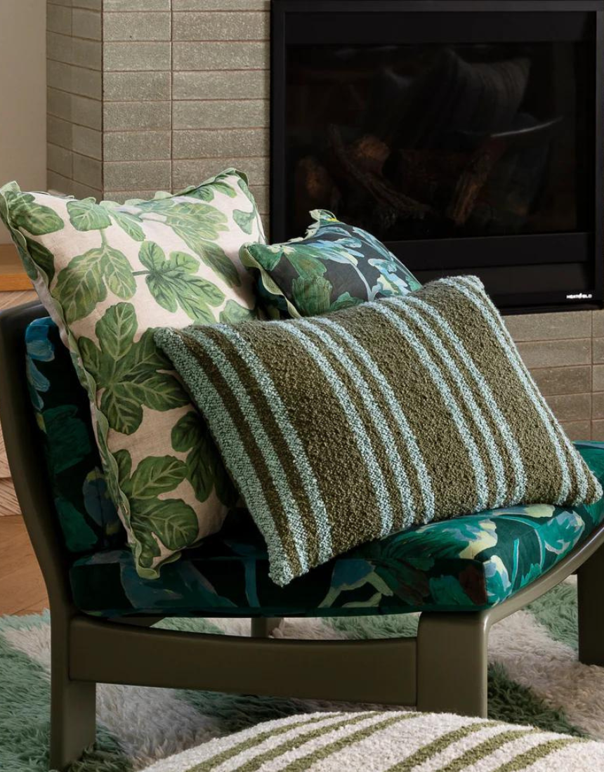Bonnie and Neil Cosmos Green Cushion 50cm featuring a vibrant floral design and plush fabric for decorative comfort.