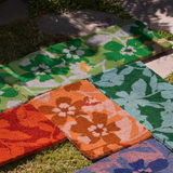 Bonnie and Neil Mallow Blue Green long door mat with floral pattern, ideal for welcoming outdoor entryways