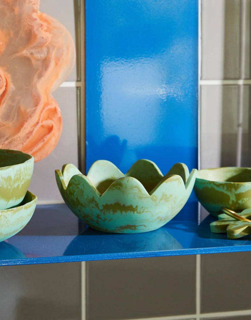 Sage x Clare Petal Bowl Artichoke dinnerware with a floral petal design in soft green and beige tones.