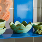 Sage x Clare Petal Bowl Artichoke dinnerware with a floral petal design in soft green and beige tones.