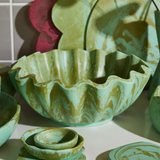 Sage x Clare Venus Bowl Artichoke dinnerware with a vibrant artichoke design, showcasing intricate patterns and colorful details.