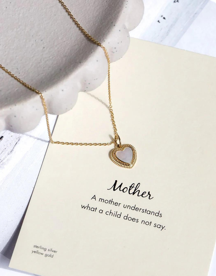 Petals Australia mother of pearl necklace featuring delicate petal-shaped pendant, elegant jewelry for women.