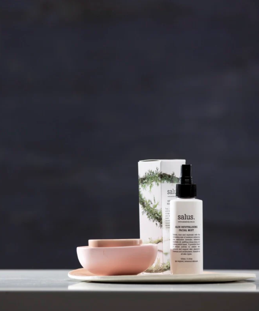 Salus Ultra Moisture Rose Facial Mist in a spray bottle, designed for nourishing and hydrating skin with rose-infused formula