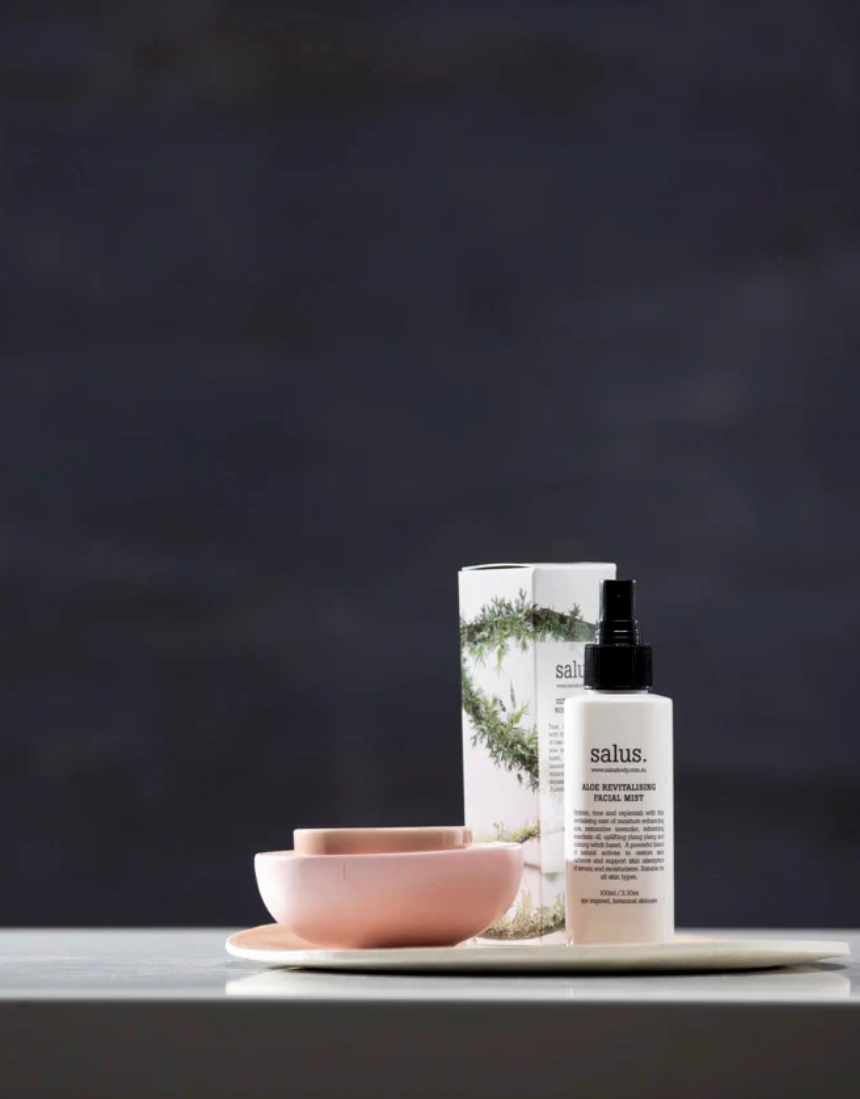 Salus Ultra Moisture Rose Facial Mist in a spray bottle, designed for nourishing and hydrating skin with rose-infused formula