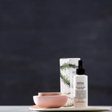 Salus Ultra Moisture Rose Facial Mist in a spray bottle, designed for nourishing and hydrating skin with rose-infused formula