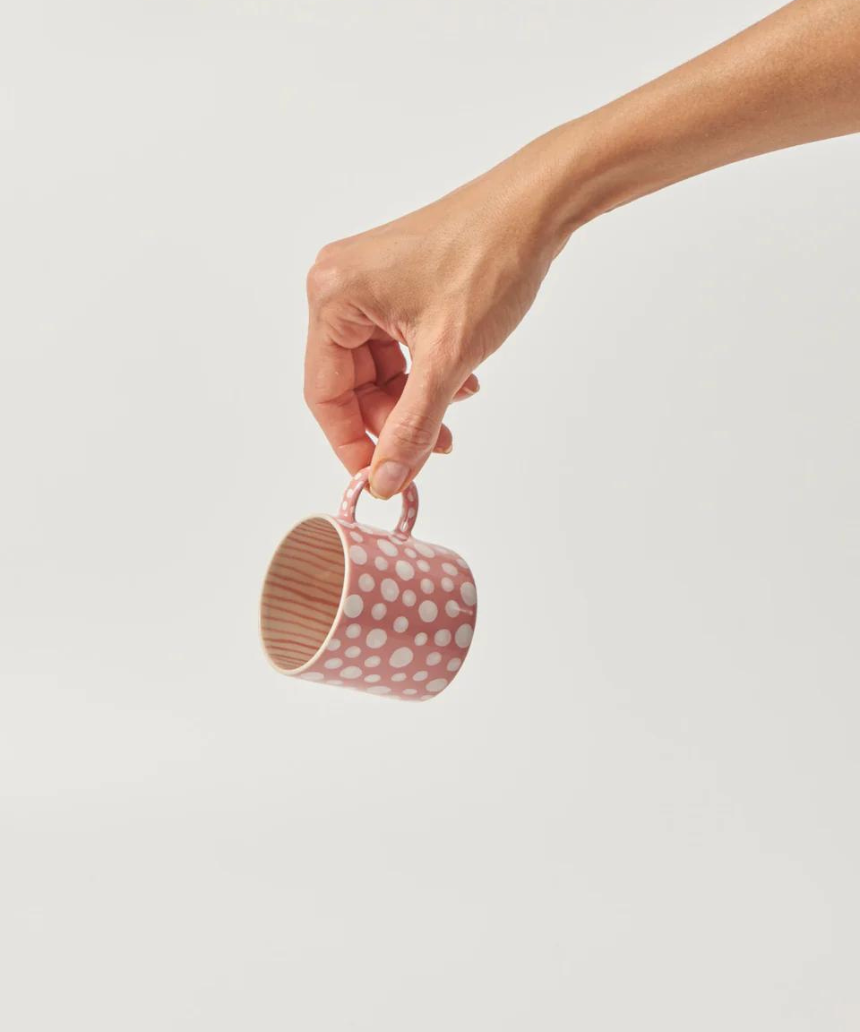 Jones & Co espresso cup with pink dot pattern, made of ceramic, featuring a classic chino style in pink and brown tones.
