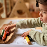 Set of Honeysticks Beeswax Crayons Super Jumbos in bright colors, featuring natural honey bee branding on eco-friendly packaging.