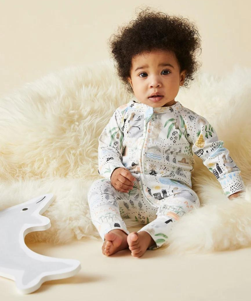 Baby Halcyon Nights Big Adventures long sleeve zip suit with colorful adventure print and soft fabric for comfortable wear.