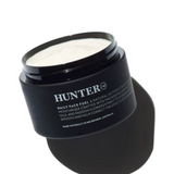 Hunter Lab Daily Face Fuel in 100ml bottle, a nourishing bath and body skincare product with a sleek design.