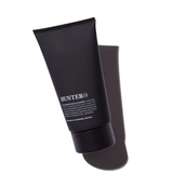 Hunter Lab Cleansing Facial Scrub in 150g jar, featuring exfoliating beads and a creamy texture for clean, refreshed skin.