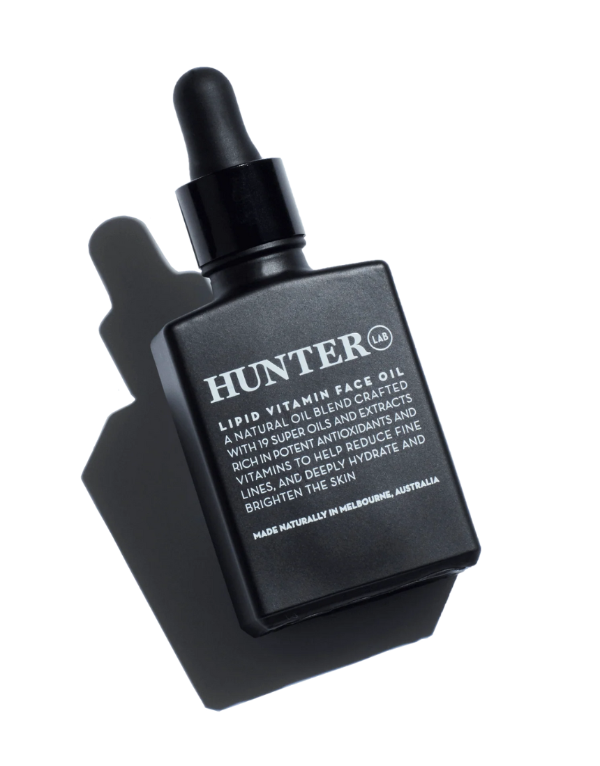 Hunter Lab Lipid Vitamin Face Oil 30ml in a clear glass bottle, designed for nourishing face and skin care.