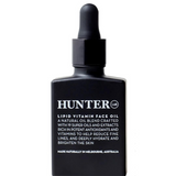 Hunter Lab Lipid Vitamin Face Oil 30ml in a clear glass dropper bottle, designed for nourishing and hydrating skin.