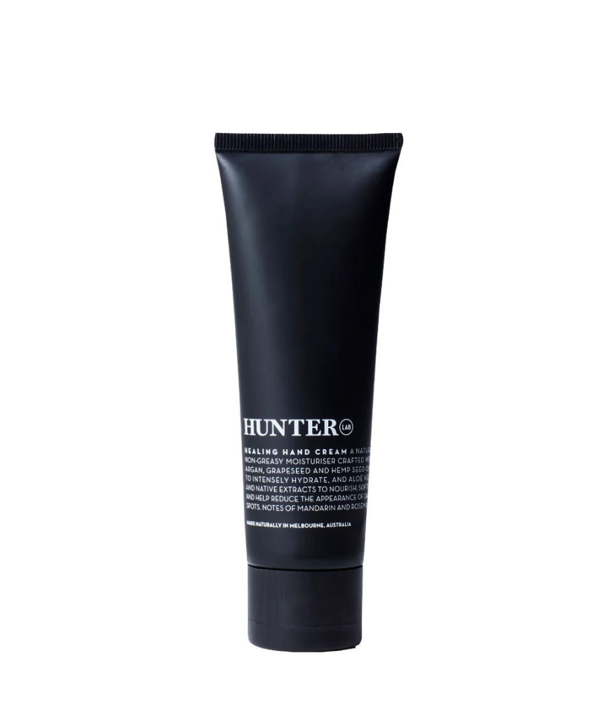 Hunter Lab Healing Hand Cream in 80ml tube, featuring a sleek design and rich moisturizing texture for soft, healthy hands.