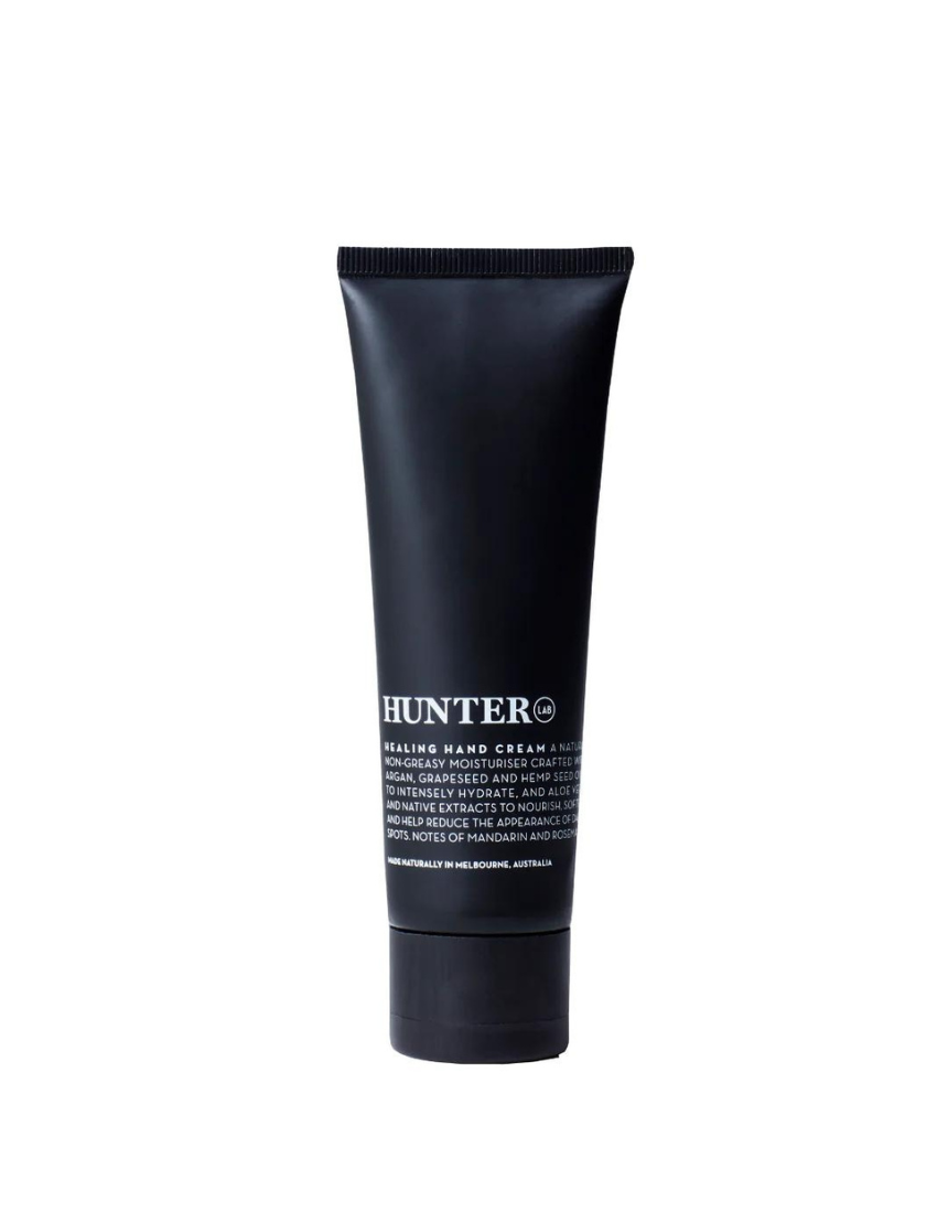 Hunter Lab Healing Hand Cream in 80ml tube, featuring a sleek design and rich moisturizing texture for soft, healthy hands.