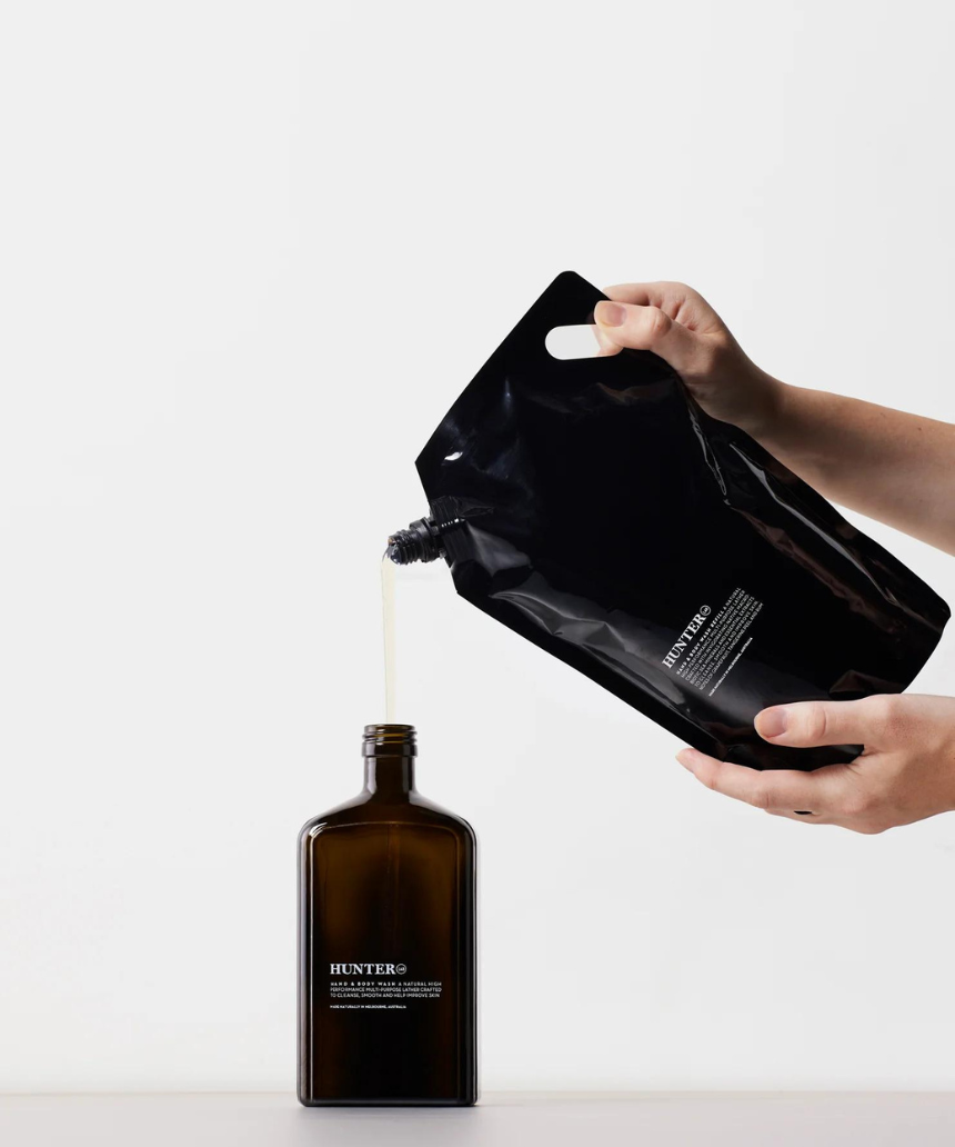 Hunter Lab Forever Kit for bath and body, featuring skincare products with sleek packaging and natural ingredients.
