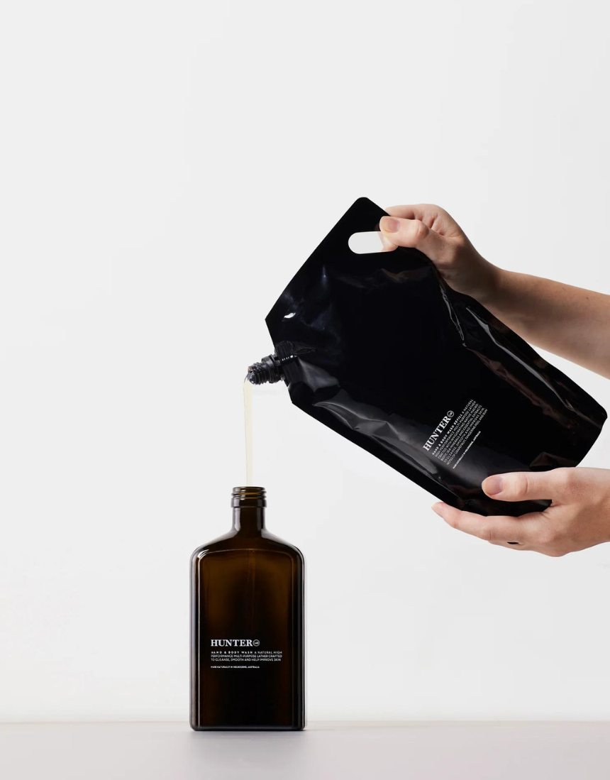 Hunter Lab Forever Kit for bath and body, featuring skincare products with sleek packaging and natural ingredients.