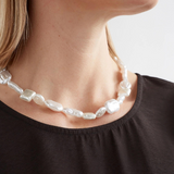 Elk Sota necklace featuring a silver chain with a minimalist pendant, stylish jewelry accessory for everyday wear