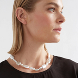 Elk Sota Necklace featuring a sleek, minimalist design with a silver finish, displayed on a neutral background.