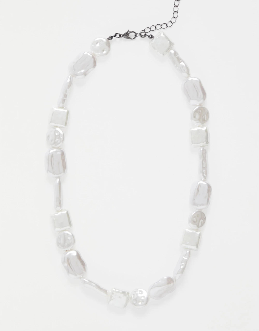 Elk Sota Necklace featuring a sleek, modern design with a silver finish, shown on a white background.